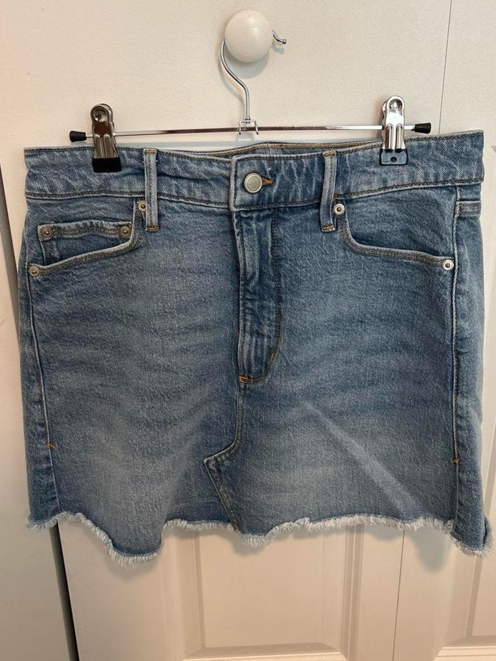 Good American Light Blue Denim Mini Skirt with Frayed Hem